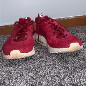 Pink/maroon/red Nike tennis shoes